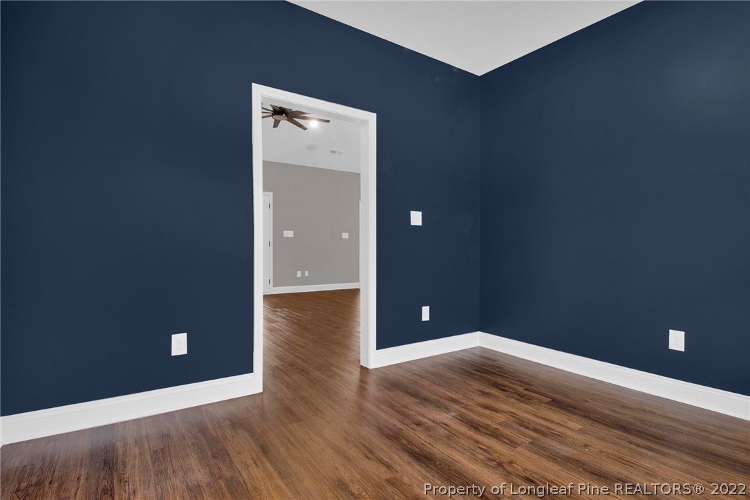 171 Mumford Road Raeford, NC 28376 - Photo 17 of 35 an empty room and wooden floor