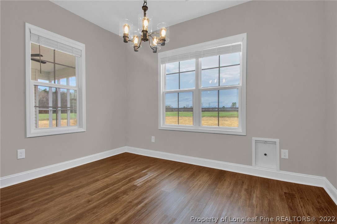 171 Mumford Road Raeford, NC 28376 - Photo 25 of 35 a view of wooden floor and windows in a room