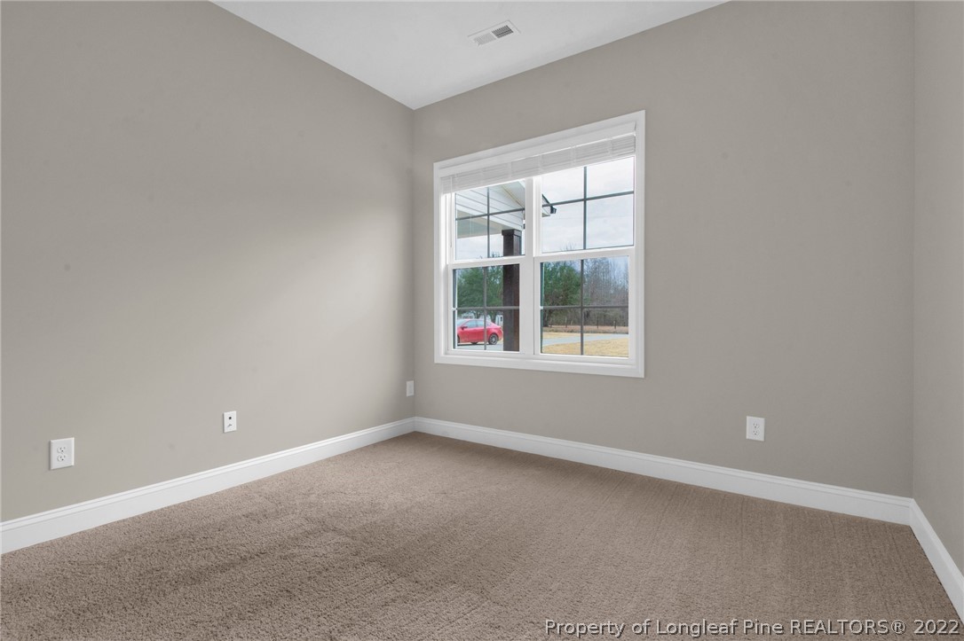 171 Mumford Road Raeford, NC 28376 - Photo 28 of 35 an empty room with windows