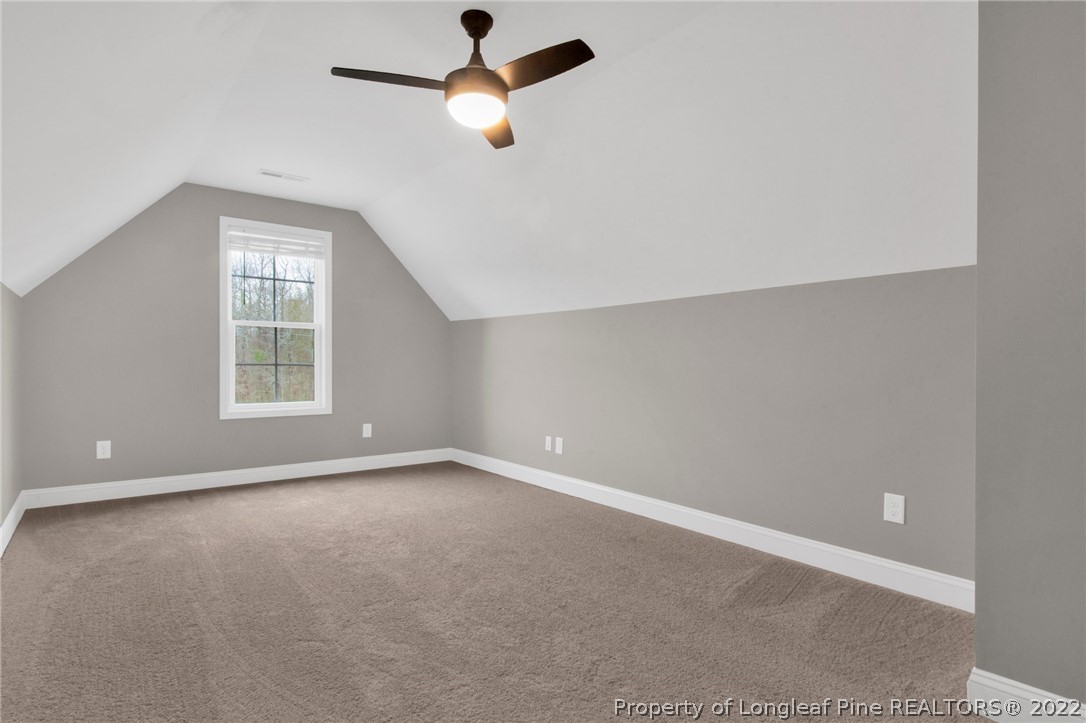 171 Mumford Road Raeford, NC 28376 - Photo 33 of 35 an empty room with a window and a ceiling fan