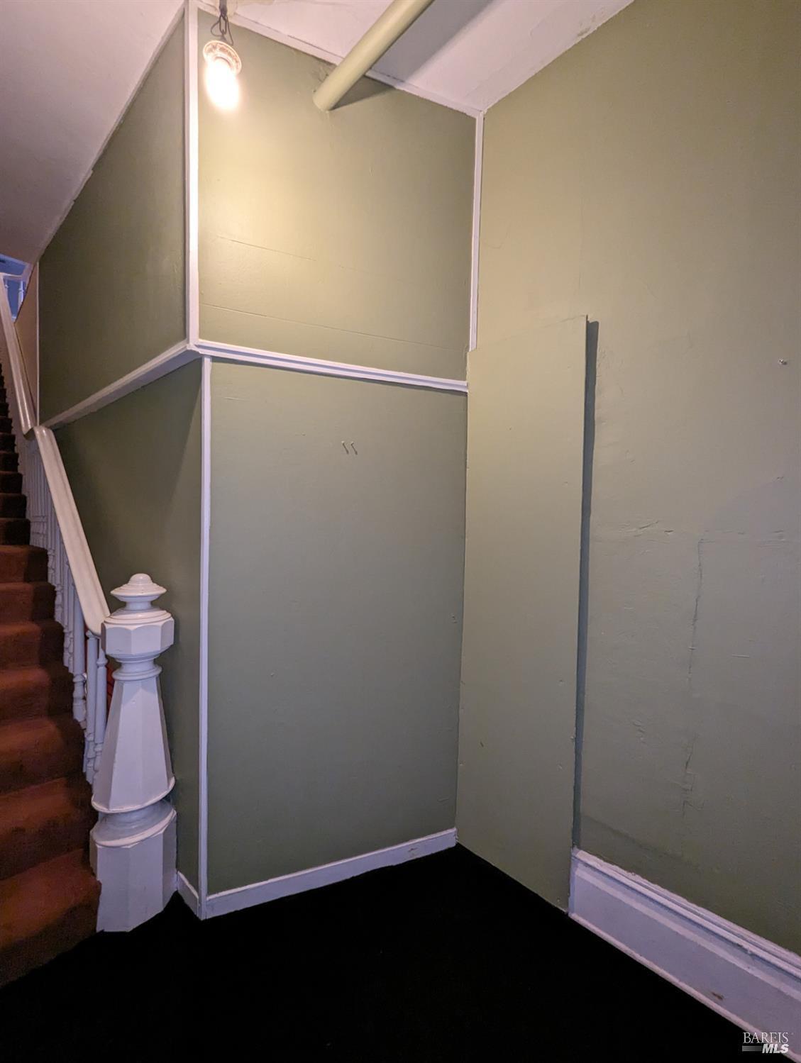 1547 4th Street, Unit A San Rafael, CA 94901 - Photo 19 of 64 a view of small space with racks on the wall