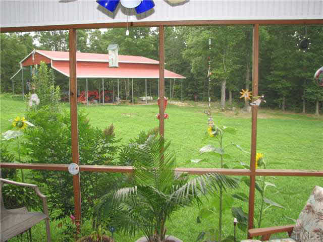 445 Wilson Brothers Road Manson, NC 27553 - Photo 13 of 21 Master bedroom has Screened Porch
