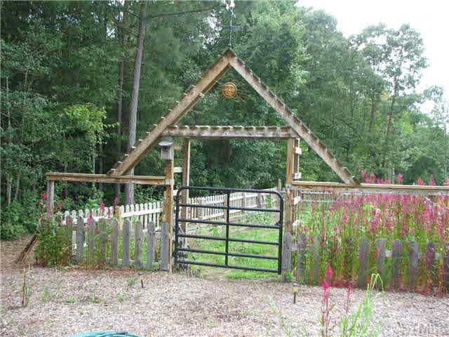 445 Wilson Brothers Road Manson, NC 27553 - Photo 19 of 21 Fenced in garden area