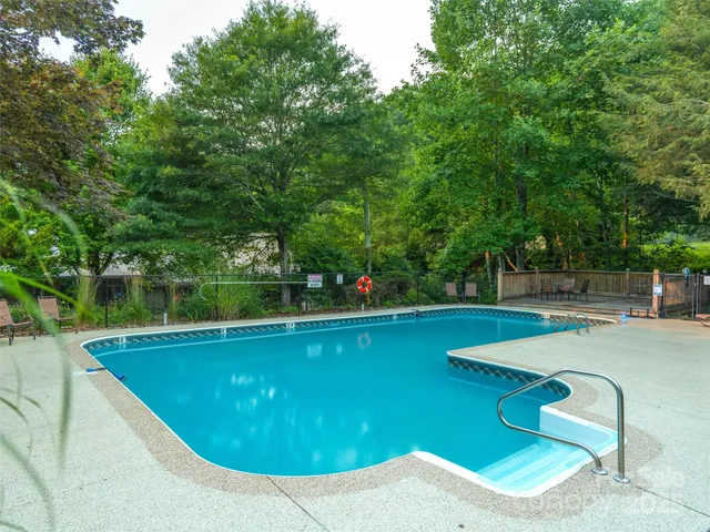 a view of outdoor space with deck and yard