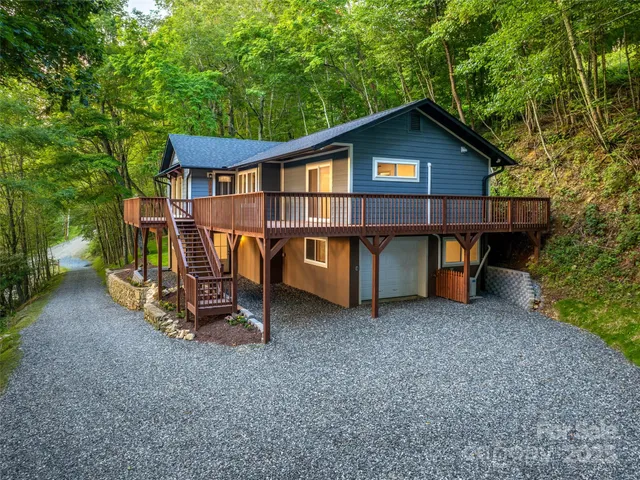 a balcony with wooden floor in front of it