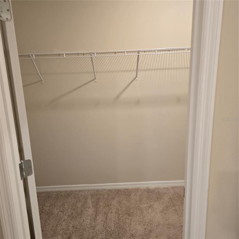 814 Sun Burst Road Winter Haven, FL 33880 - Photo 26 of 48 a view of small space with racks on the wall