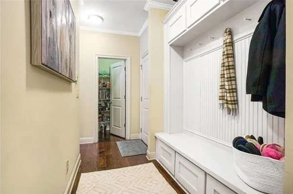a kitchen with a sink and a refrigerator