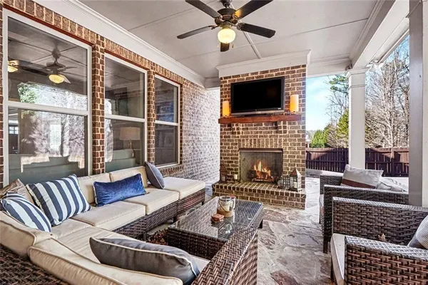 a outdoor living space with furniture and garden view