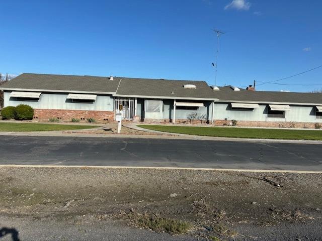 5900 Geer Road Hughson, CA 95326 - Photo 1 of 1 a front view of a house with a ocean view