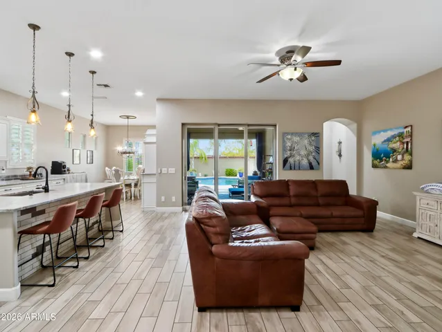 a bathroom with a sink double vanity granite and a mirror