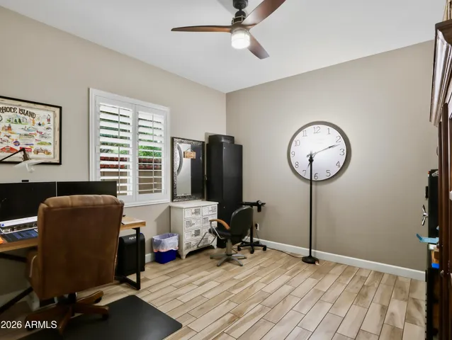 a view of swimming pool with outdoor seating and yard in back
