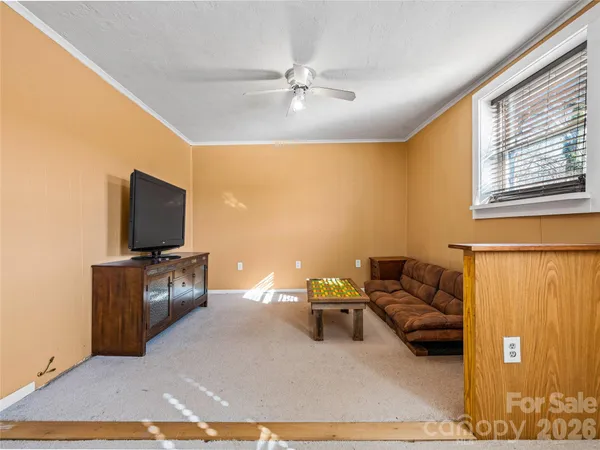 a view of a projector room with a tv