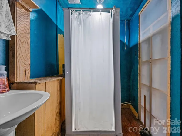 a kitchen with a stove and a microwave