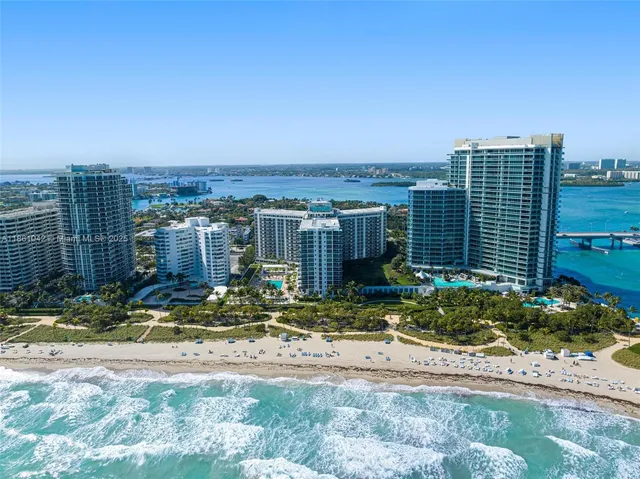 a front view of a building with outdoor seating