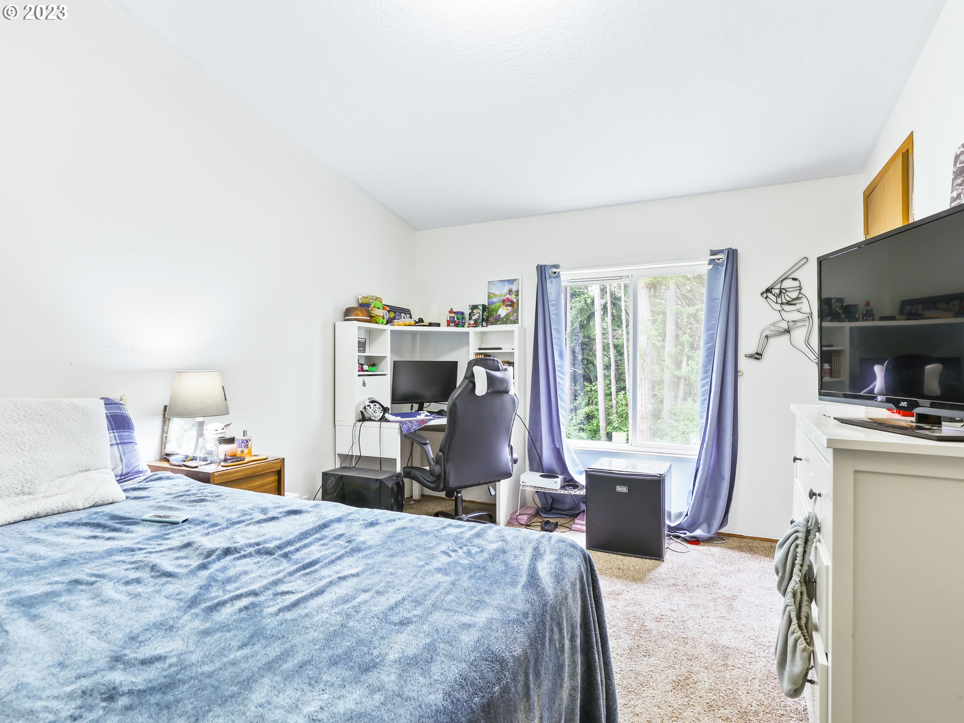 16625 South Redland Road Oregon City, OR 97045 - Photo 15 of 28 a bedroom with a bed and wooden floor