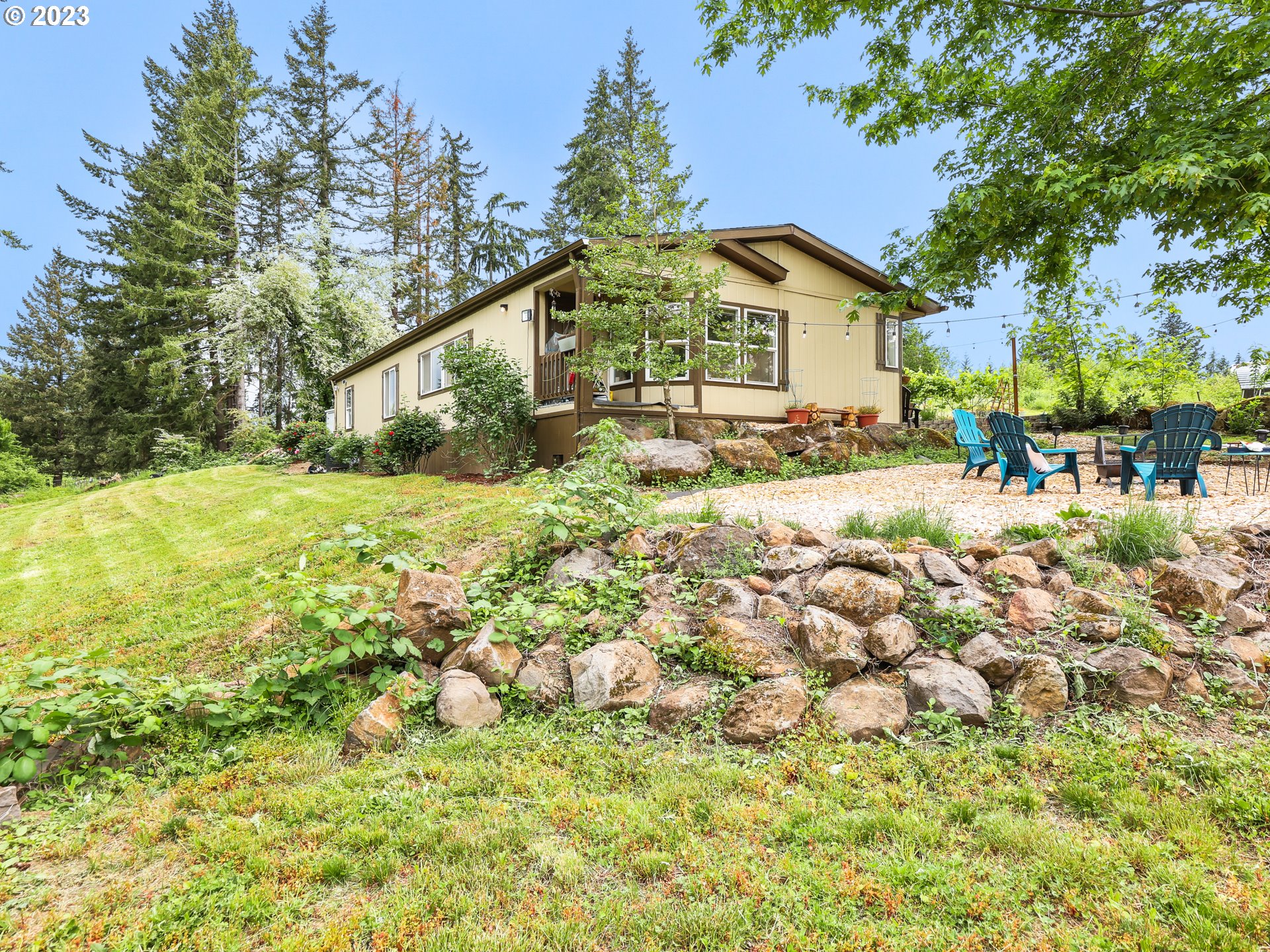 16625 South Redland Road Oregon City, OR 97045 - Photo 21 of 28 a view of a house with a yard