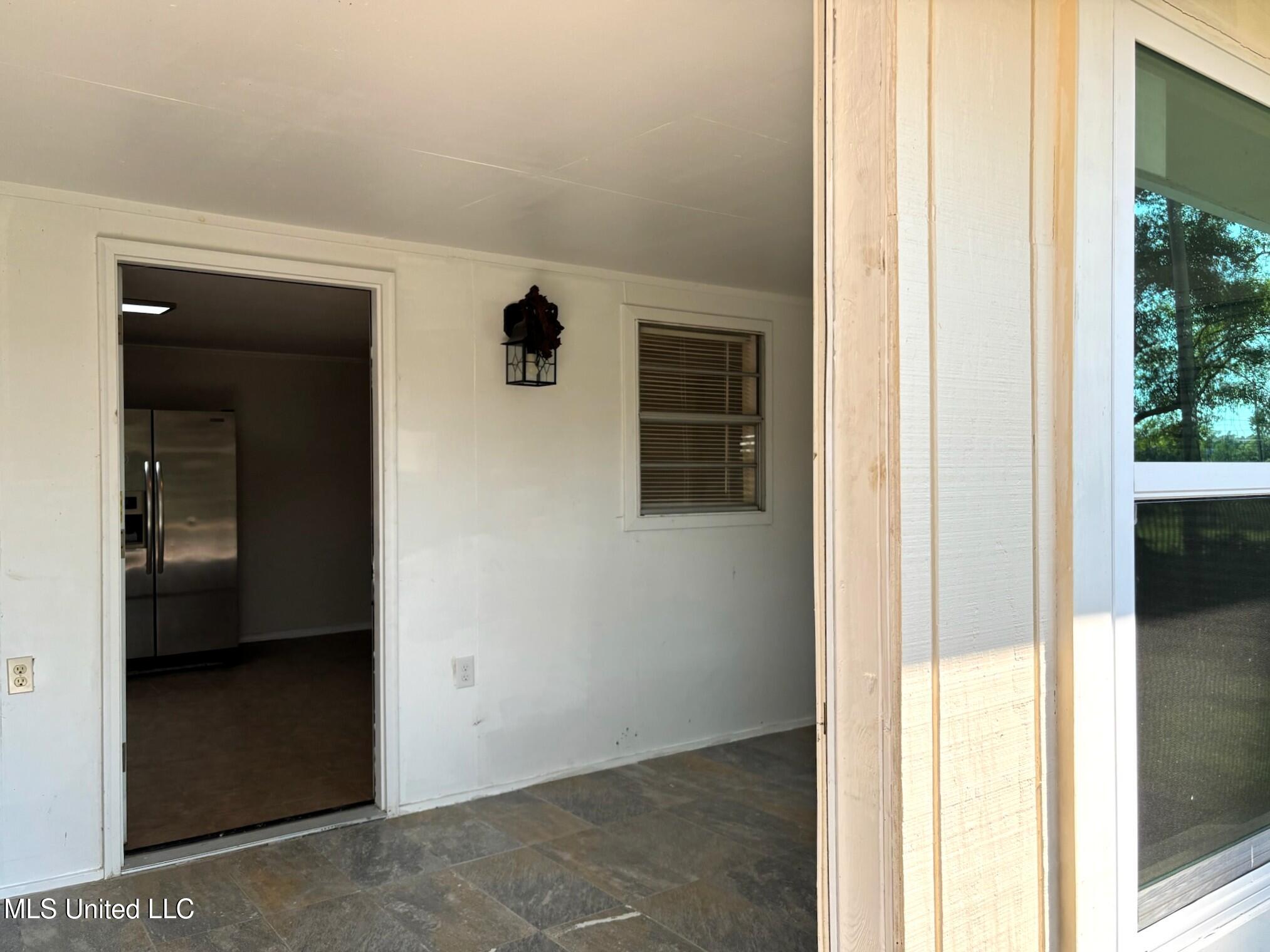 20260 28th Street Long Beach, MS 39560 - Photo 10 of 16 sunroom or office