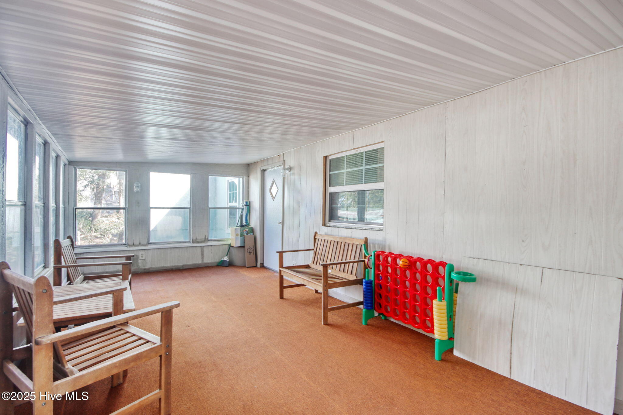 9161 Riveredge Place Southwest Calabash, NC 28467 - Photo 16 of 30 This sunroom is pretty nice and has a separate window ac.