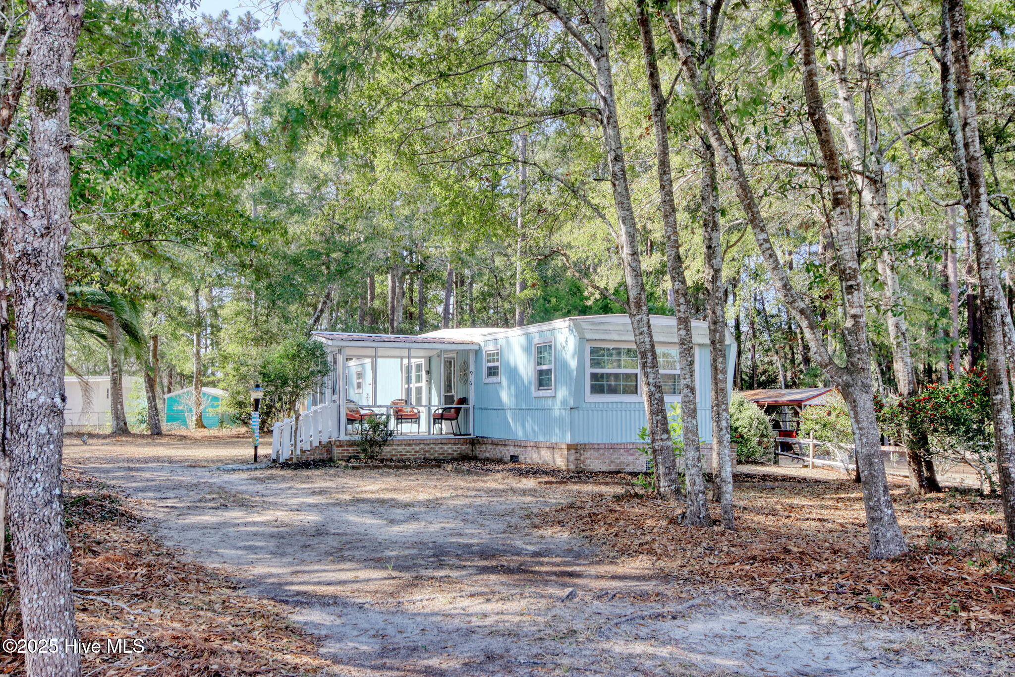 9161 Riveredge Place Southwest Calabash, NC 28467 - Photo 17 of 30 Private driveway leading up to this special retreat