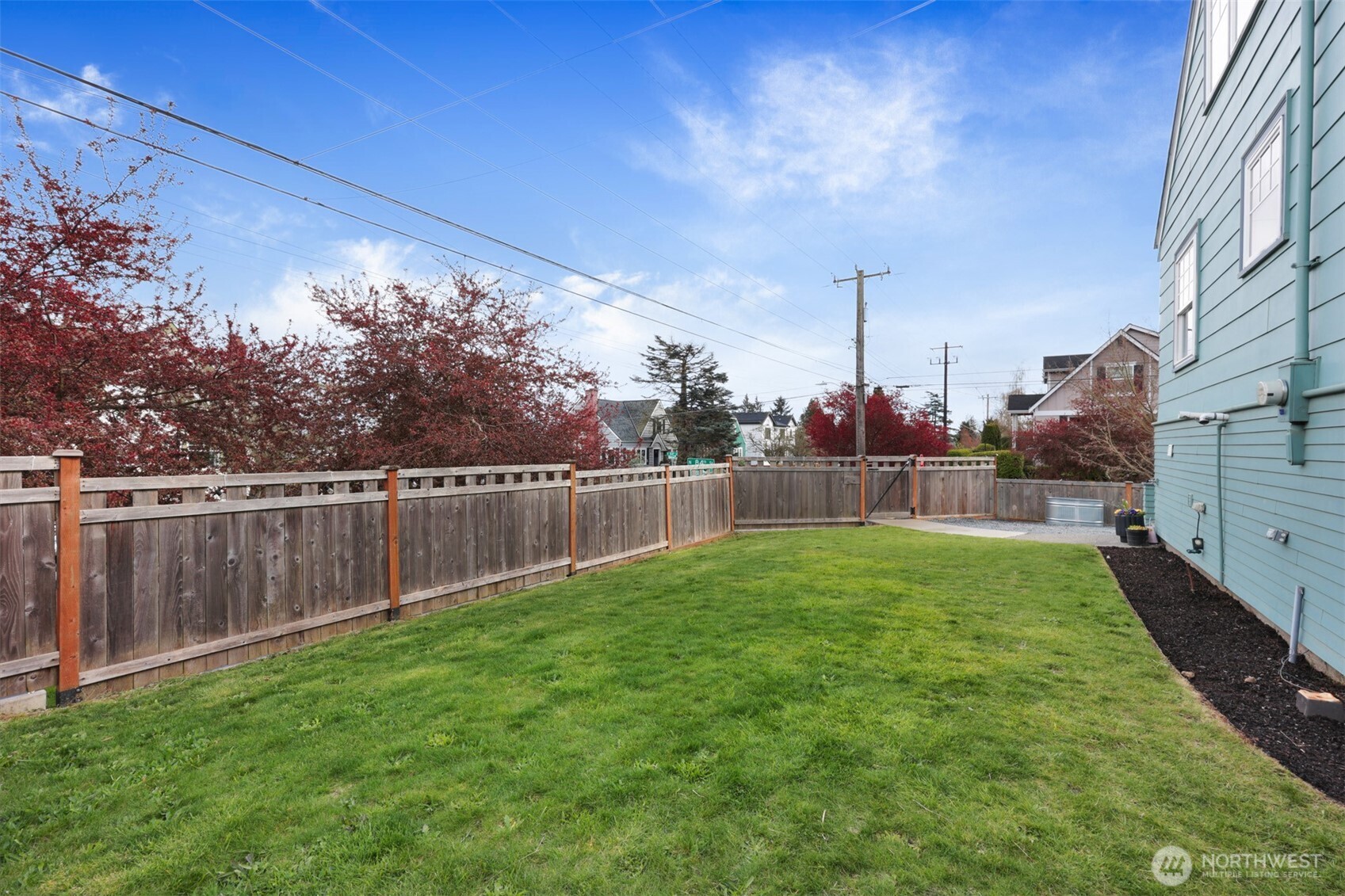 8401 Linden Avenue North Seattle, WA 98103 - Photo 17 of 36 a view of a backyard
