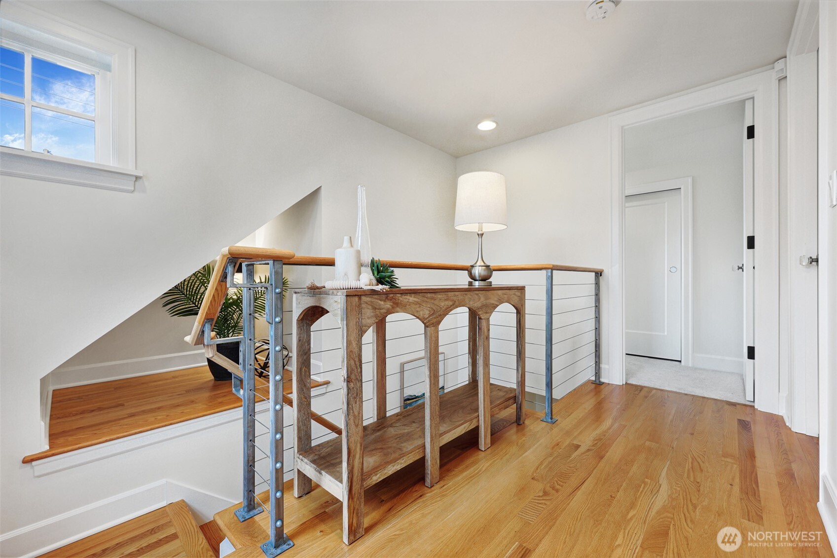 8401 Linden Avenue North Seattle, WA 98103 - Photo 20 of 36 a view of entryway with wooden floor