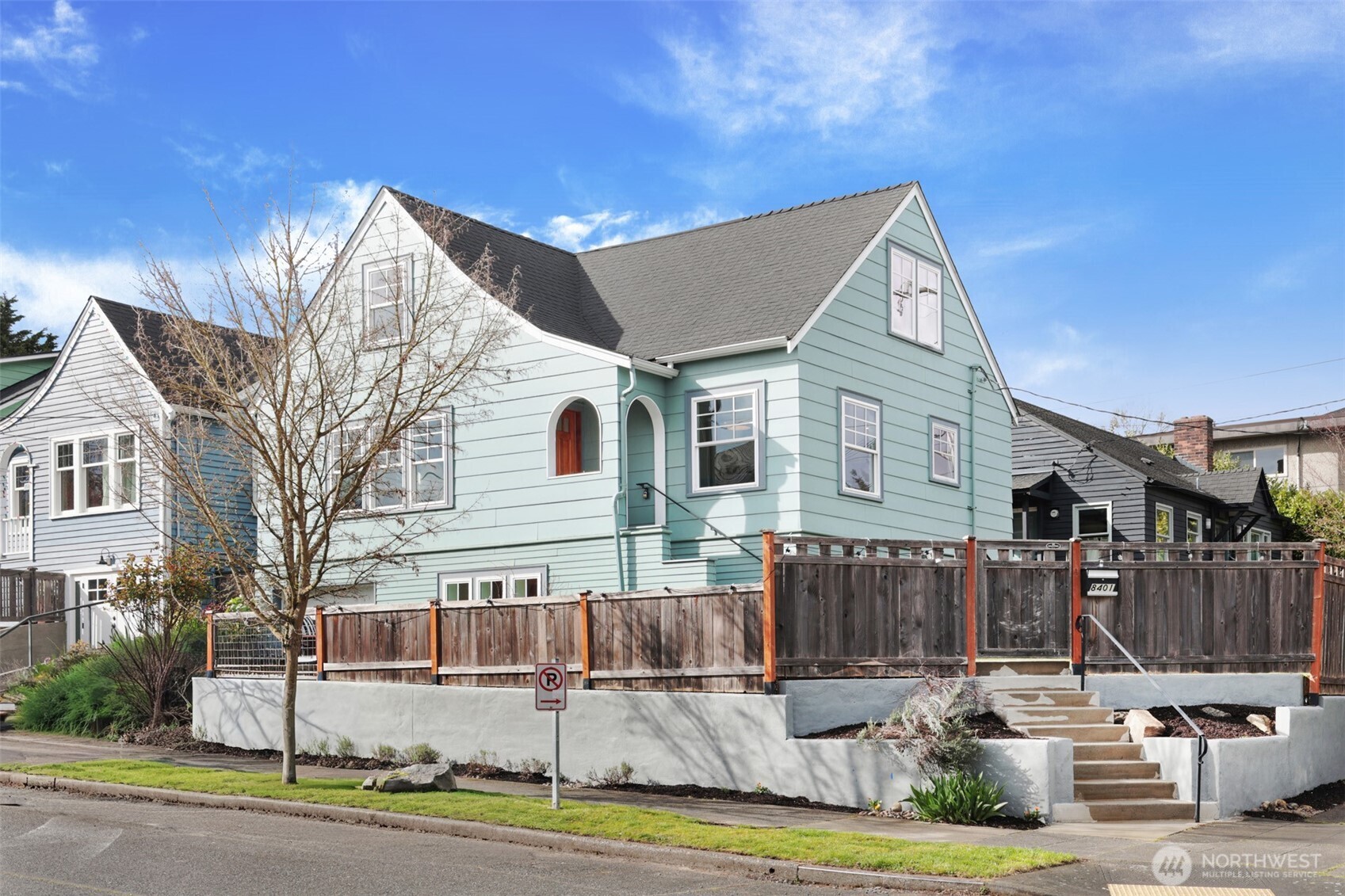 8401 Linden Avenue North Seattle, WA 98103 - Photo 2 of 36 a front view of a house with a yard