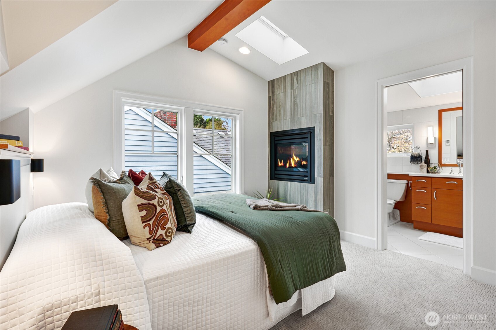 8401 Linden Avenue North Seattle, WA 98103 - Photo 21 of 36 a bedroom with a bed and a couch