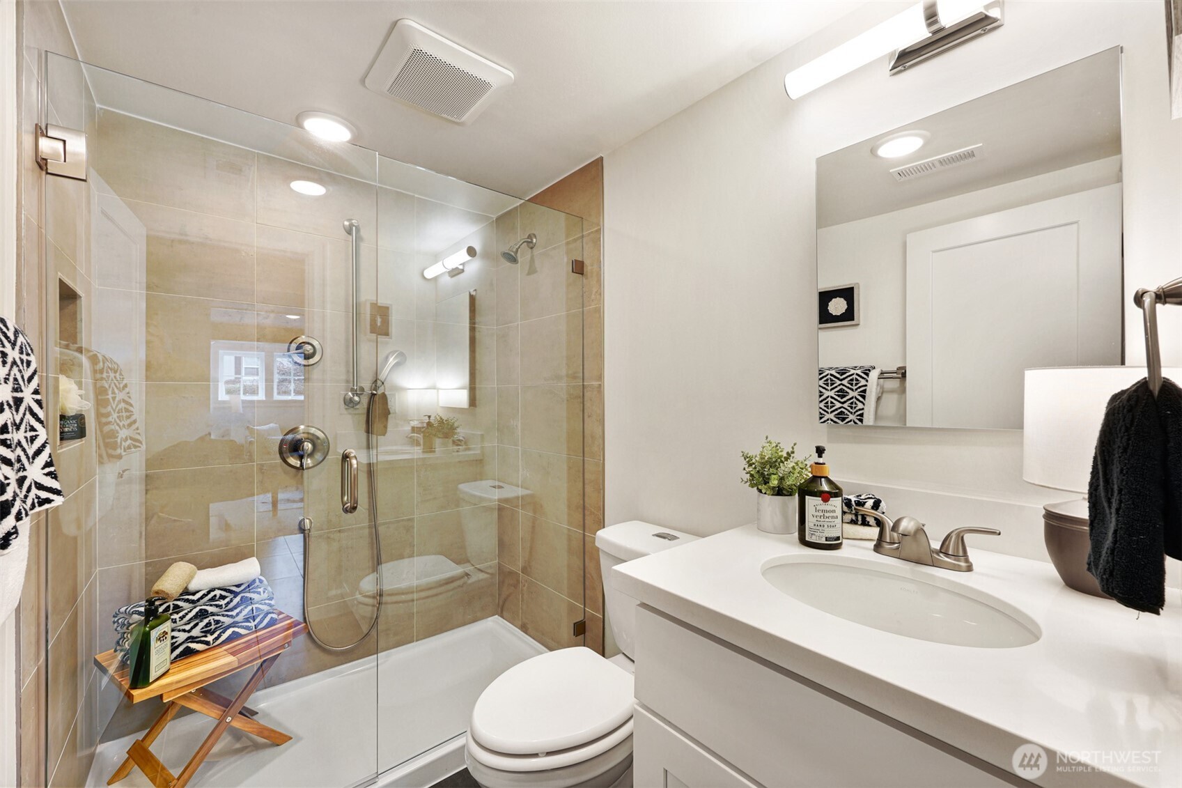 8401 Linden Avenue North Seattle, WA 98103 - Photo 29 of 36 a bathroom with a sink a toilet and shower