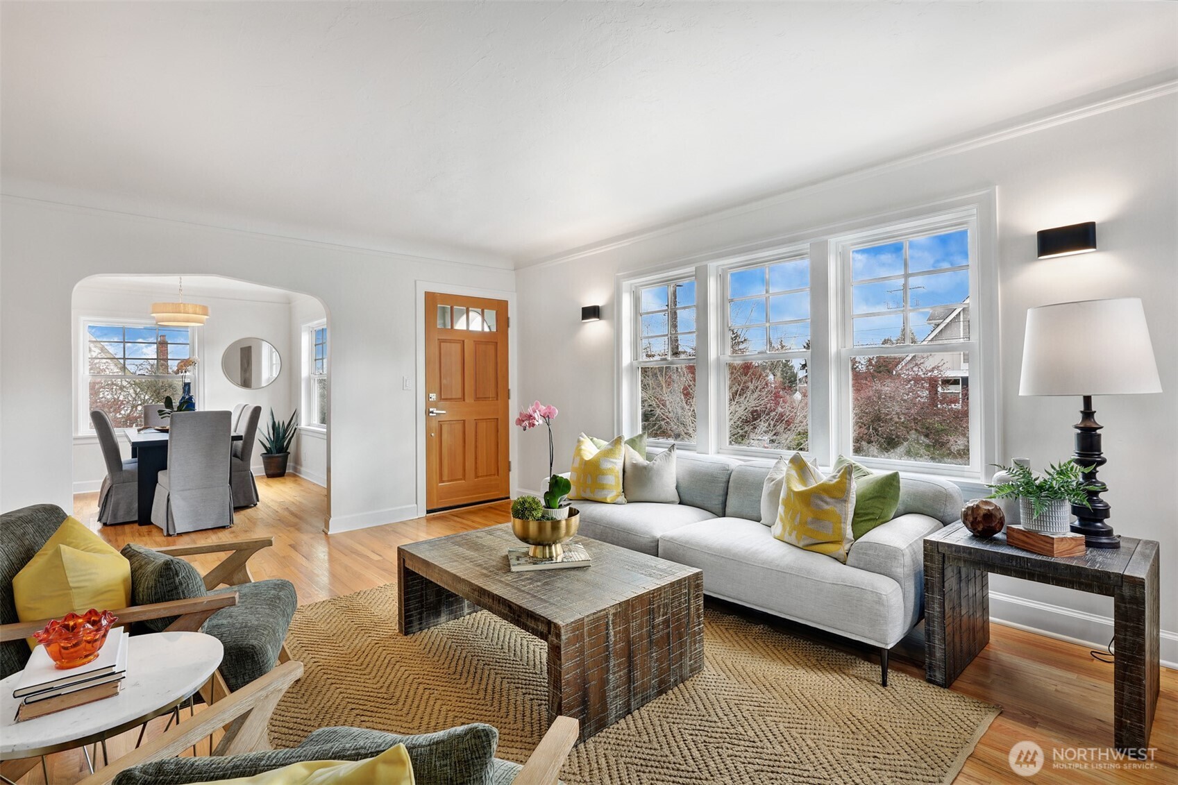 8401 Linden Avenue North Seattle, WA 98103 - Photo 3 of 36 a living room with furniture wooden floor and a large window
