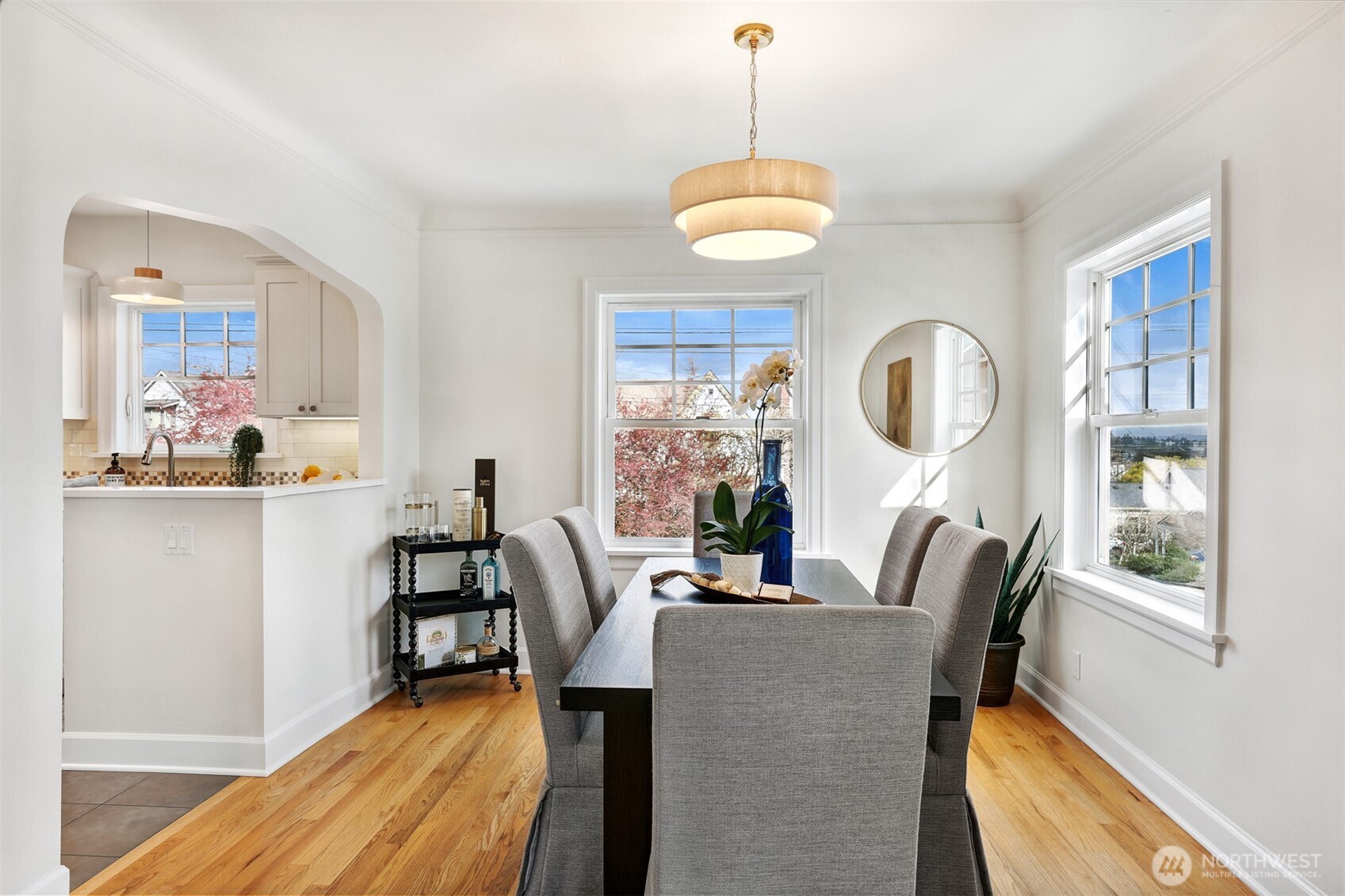 8401 Linden Avenue North Seattle, WA 98103 - Photo 10 of 36 a view of a dining room with furniture and a window