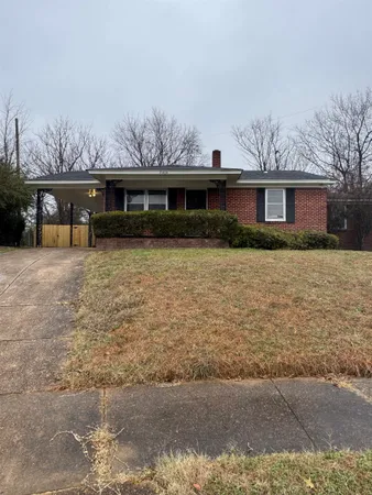a front view of a house with yard