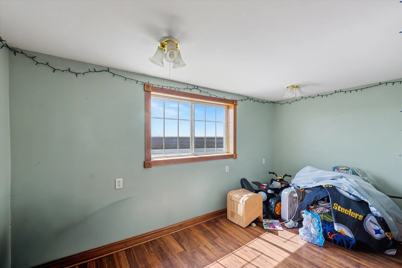 110 Highway 54 Roberts, IL 60962 - Photo 13 of 31 a bedroom with bed and a window