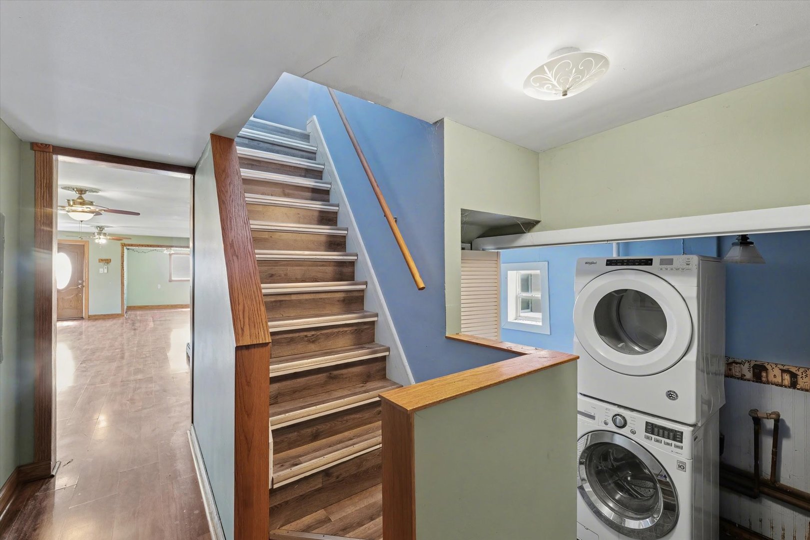 110 Highway 54 Roberts, IL 60962 - Photo 19 of 31 a view of a hallway with washer and dryer