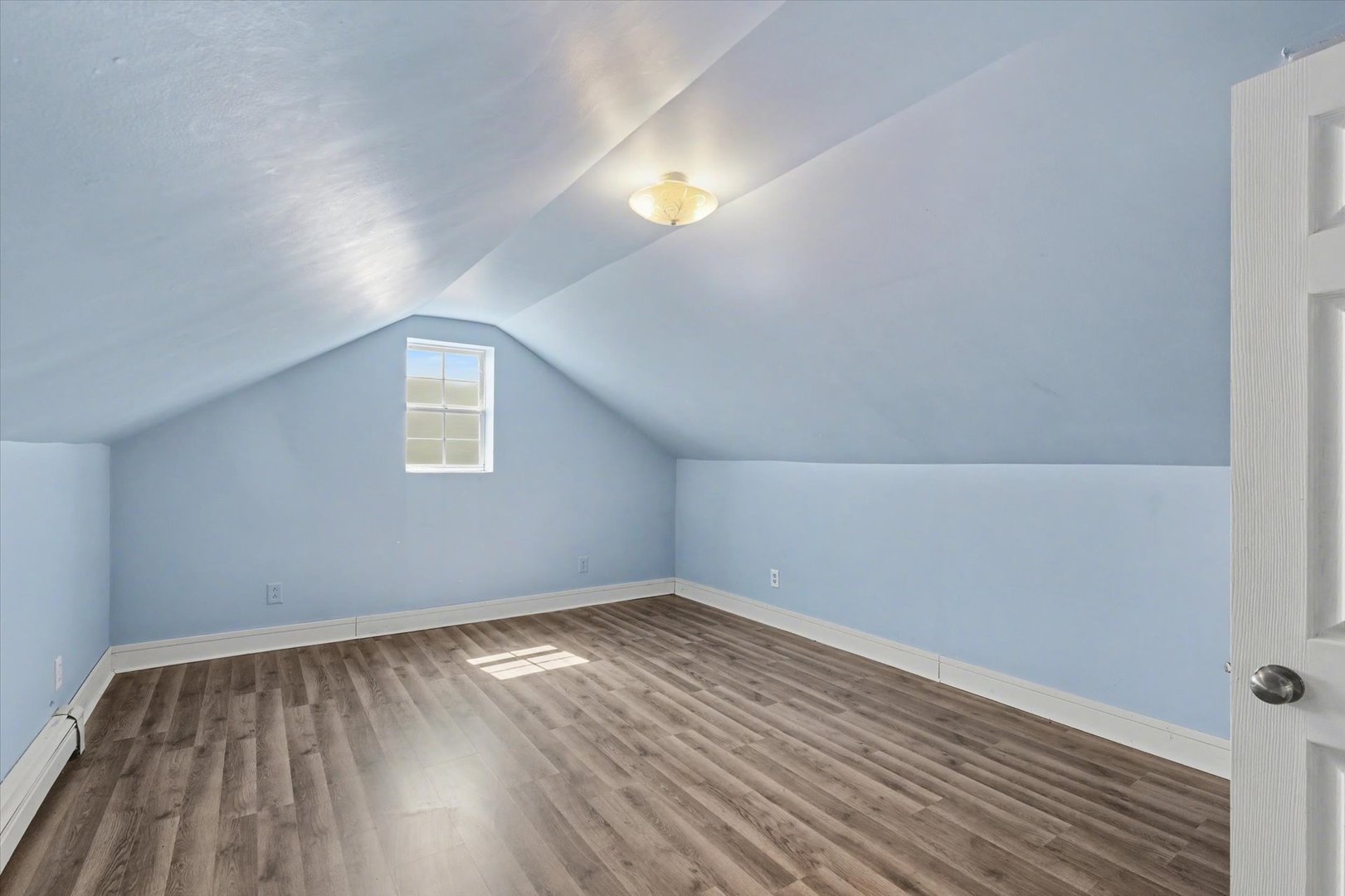 110 Highway 54 Roberts, IL 60962 - Photo 25 of 31 an empty room with wooden floor and windows