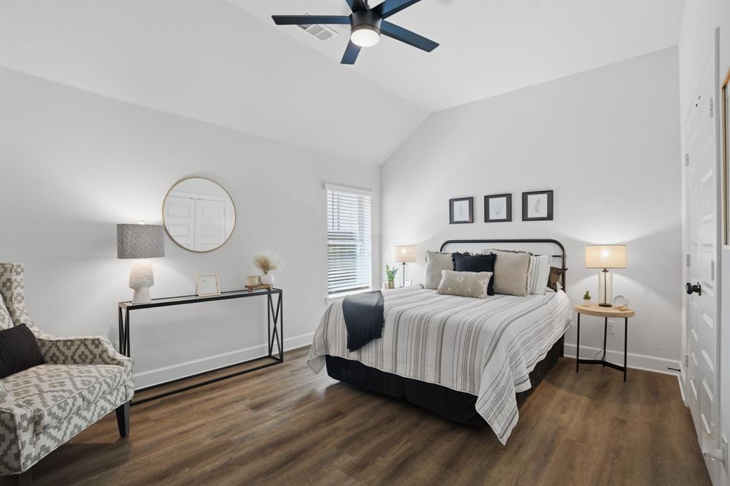 1632 Cotton Road Van Alstyne, TX 75495 - Photo 20 of 40 a bedroom with a bed mirror and window