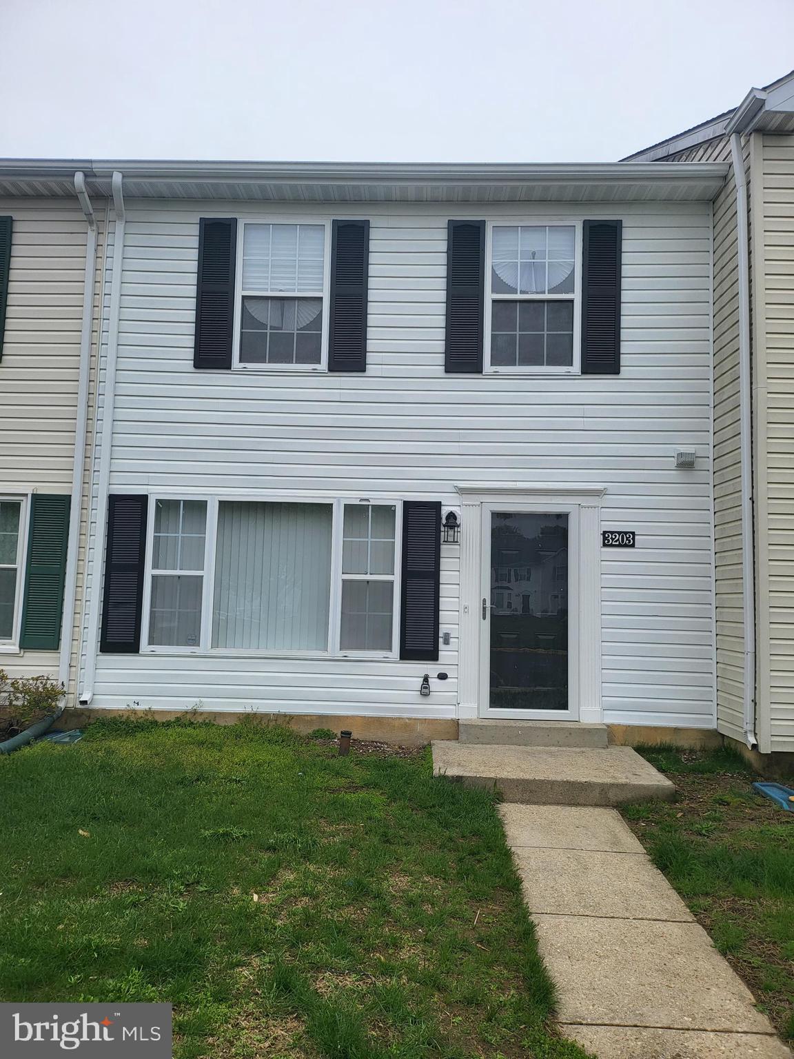3203 Prince Ranier Place District Heights, MD 20747 - Photo 1 of 18 a front view of a house with a yard