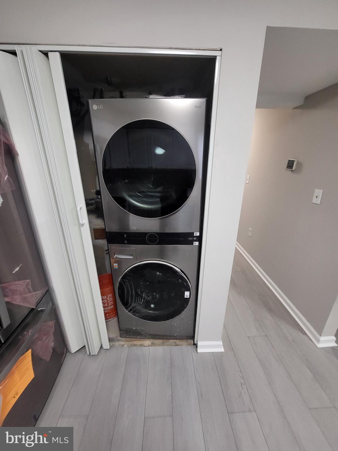3203 Prince Ranier Place District Heights, MD 20747 - Photo 9 of 18 a close up view of a washer and dryer