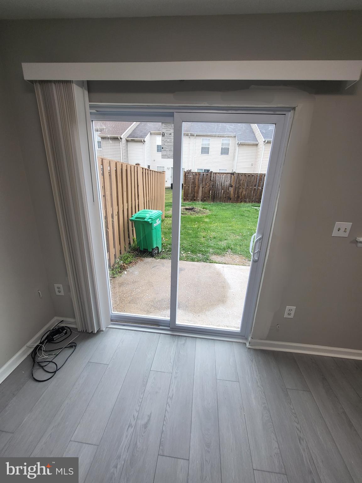 3203 Prince Ranier Place District Heights, MD 20747 - Photo 10 of 18 a view of a porch with wooden floor and garden