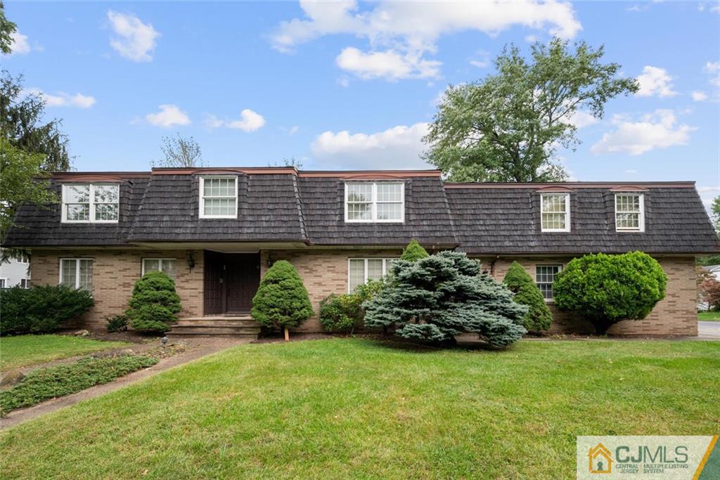 1 Winter Street Edison, NJ 08820 - Photo 1 of 36 a front view of a house with a garden
