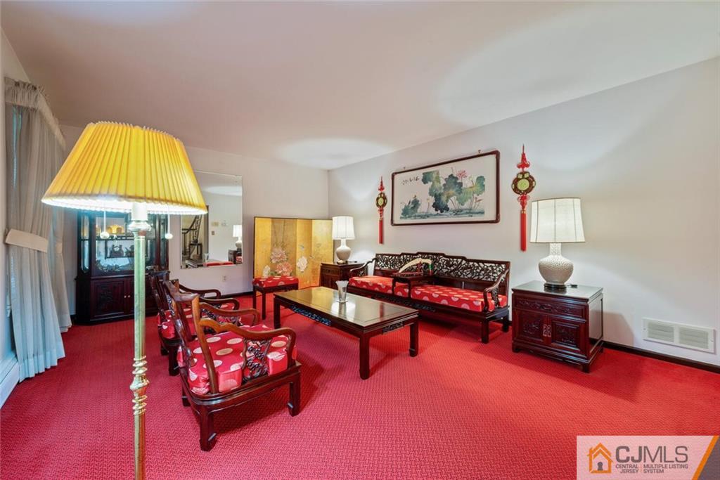 1 Winter Street Edison, NJ 08820 - Photo 9 of 36 a living room with furniture and a pool table