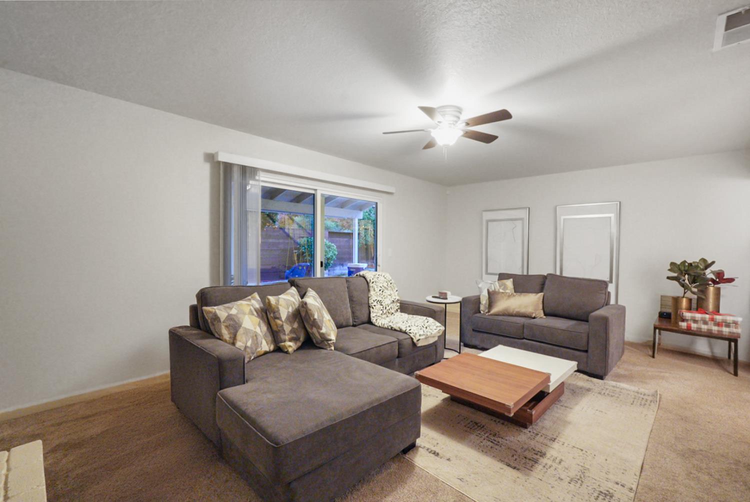 1820 North Berkeley Avenue Turlock, CA 95382 - Photo 14 of 29 a living room with furniture and a couch