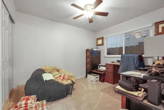 a view of a livingroom with washer and dryer