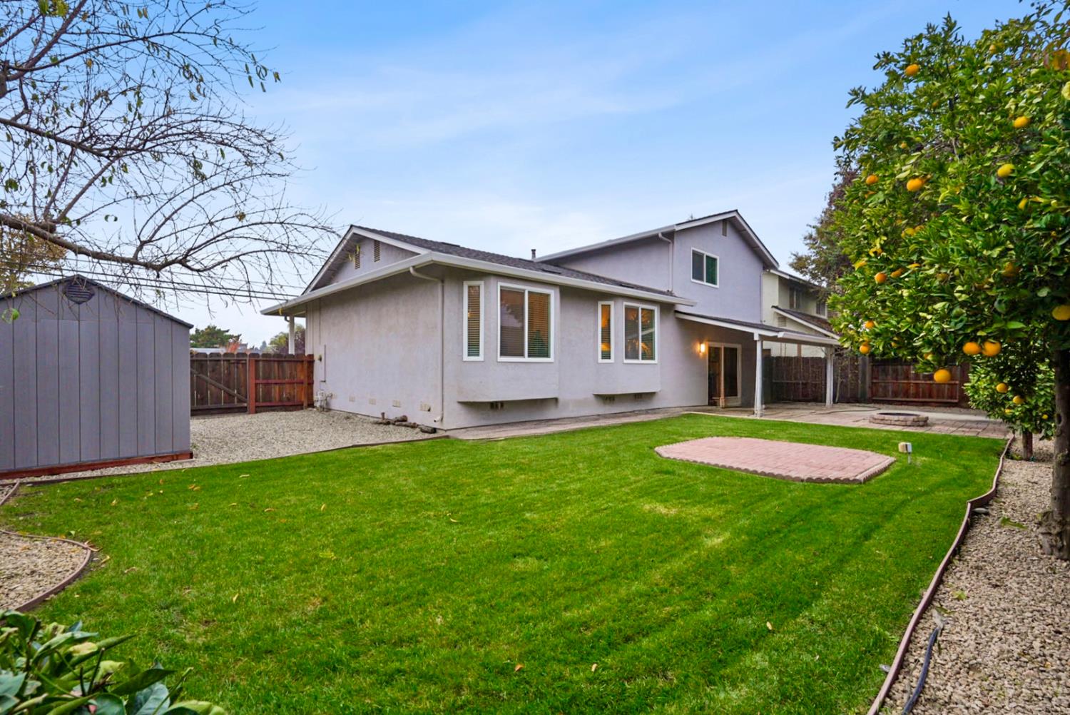 1820 North Berkeley Avenue Turlock, CA 95382 - Photo 27 of 29 a front view of a house with yard and tree