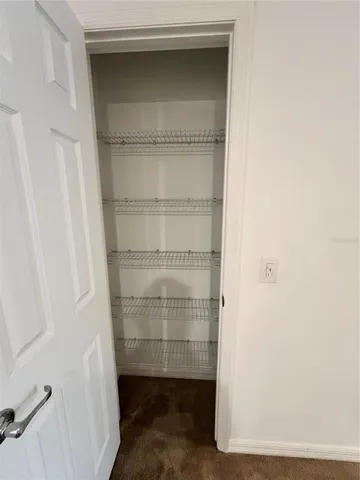 a room with storage and utility