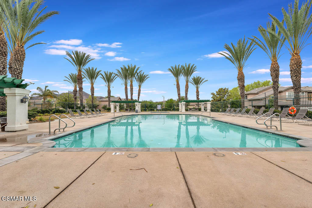 272 Springmist Lane Simi Valley, CA 93065 - Photo 44 of 47 a view of swimming pool with outdoor seating and palm trees