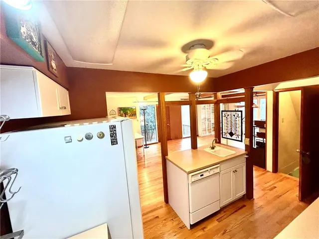 a view of balcony with wooden floor