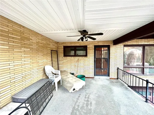 a white toilet sitting next to a bathroom sink