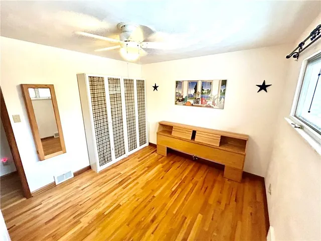 a bathroom with a tub and a sink