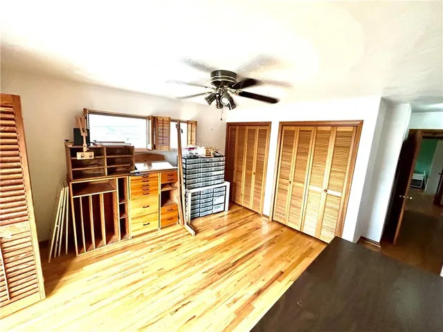 a view of living room with furniture and a flat screen tv