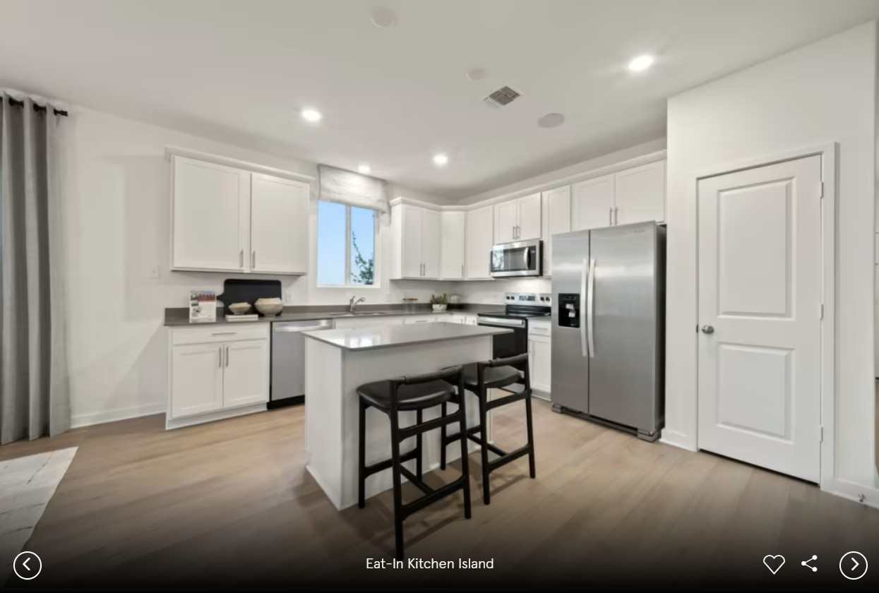 1327 Sky Rdg Court Belton, TX 76513 - Photo 5 of 8 a kitchen with a refrigerator a counter top space and cabinets